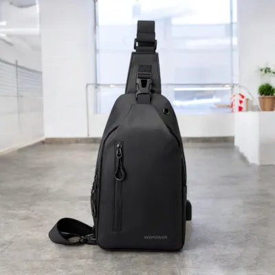 NOMAD CARRIER CHEST BAG